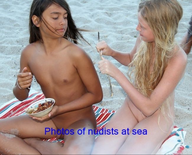 Summer holidays on a nudist beach photo Summer holidays on a nudist beach photo